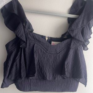 Navy ruffled top. Worn once. Perfect condition.